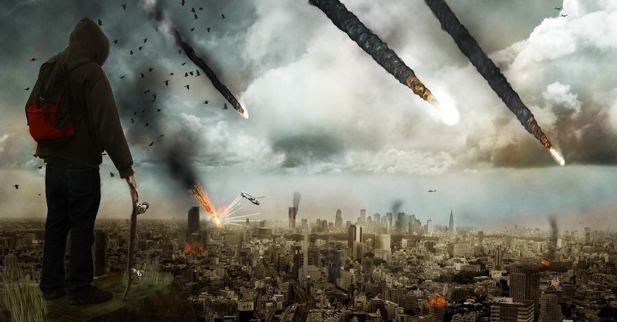 Muž hledící na zkázu města pádem meteoritů